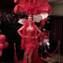 Sin City Entertainment - Our stunning showgirl dressed in the corset style red showgirl costume.