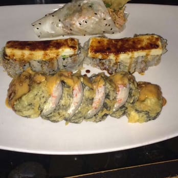 Tomodachi Sushi - Back to front: Tina's hand roll, Japanese Lasagna, Tempura #1 - Sushi Bars Near Me - Austin, Texas