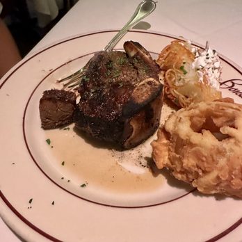 Bones - Bone in filet with onion rings and hash browns - Steakhouses Near Me - Atlanta, Georgia