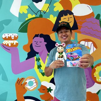 Island Glazed - Owner Daniel with his cherished mementos! - Coffee & Tea Near Me - Aiea, Hawaii