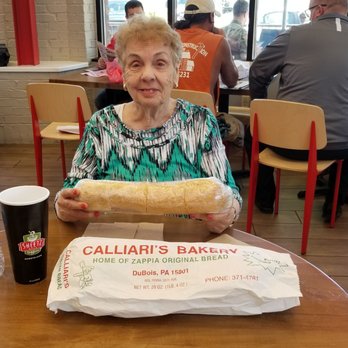 Calliari's Bakery - My 80+ yr old mom with her whole sandwich! It did take us days to eat!!! - Bakeries Near Me - Du Bois, Pennsylvania