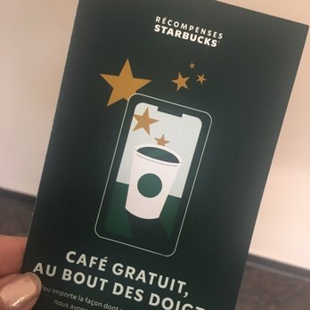 Starbucks - a hand holding a starbucks starbucks card - Coffee & Tea Near Me - Montreal, Quebec Starbucks - a hand holding a starbucks starbucks card - Coffee & Tea Near Me - Montreal, Quebec