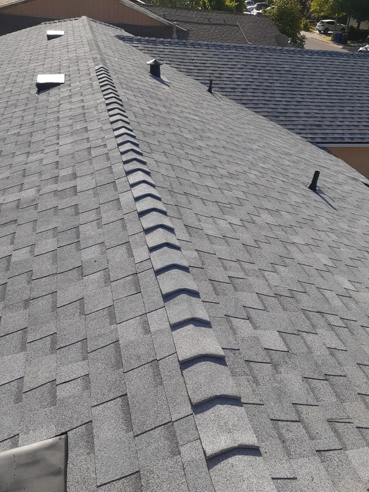 Slide of TopCal Roofing