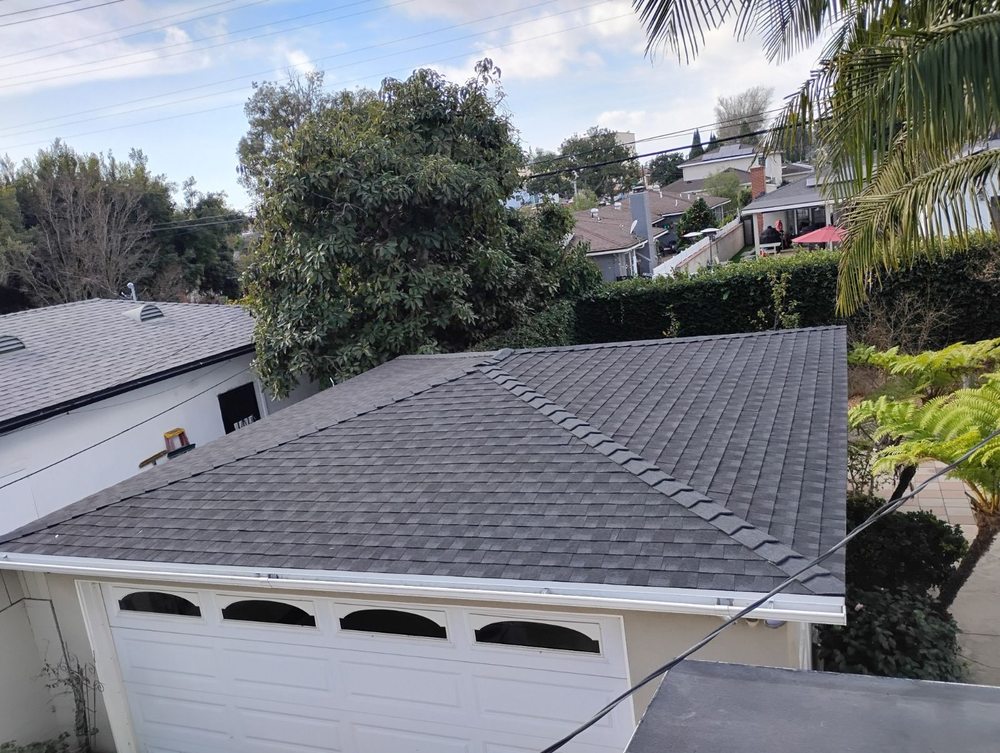 Slide of Sam's Roofing Co