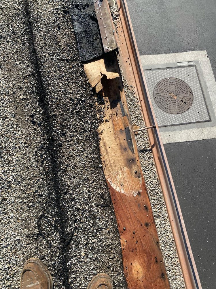 Slide of BD&E Roofing Services