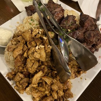 Dvine Mediterranean Experience - Brea - Arabic family platter for four with chicken shawarma, beef and lamb kebab and bomb rice - Mediterranean Near Me - Brea, California Dvine Mediterranean Experience - Brea - Arabic family platter for four with chicken shawarma, beef and lamb kebab and bomb rice - Mediterranean Near Me - Brea, California