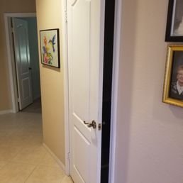 Rehung door to a half bath. Rehung door to a half bath.