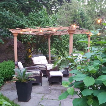 Inn At Twaalfskill - Outdoor sitting area... low lighting in a green, serene setting. - Hotels Near Me - Highland, New York Inn At Twaalfskill - Outdoor sitting area... low lighting in a green, serene setting. - Hotels Near Me - Highland, New York