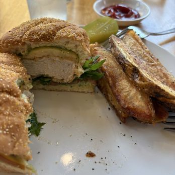 The Vine Trattoria - Crispy chicken sandwich with French fries. It was served on a soft roll with lettuce, tomato, pesto and smoked Gouda cheese. - Italian Near Me - Berkeley Springs, West Virginia