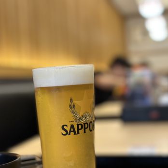 1920Bar - a glass of sappo beer on a table - Sports Bars Near Me - San Francisco, California