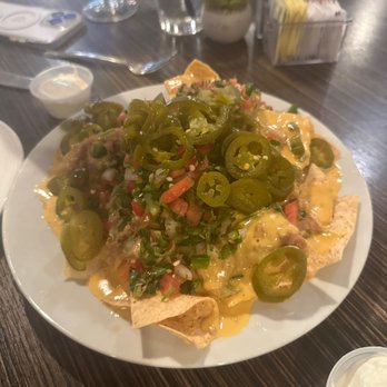 Desert Pass - nachos on a white plate - Lounges Near Me - El Paso, Texas Desert Pass - nachos on a white plate - Lounges Near Me - El Paso, Texas