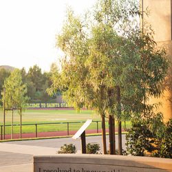 Crean Lutheran High School - Campus Views: 1 Corinthians 2:2 Courtyard and Saints Stadium