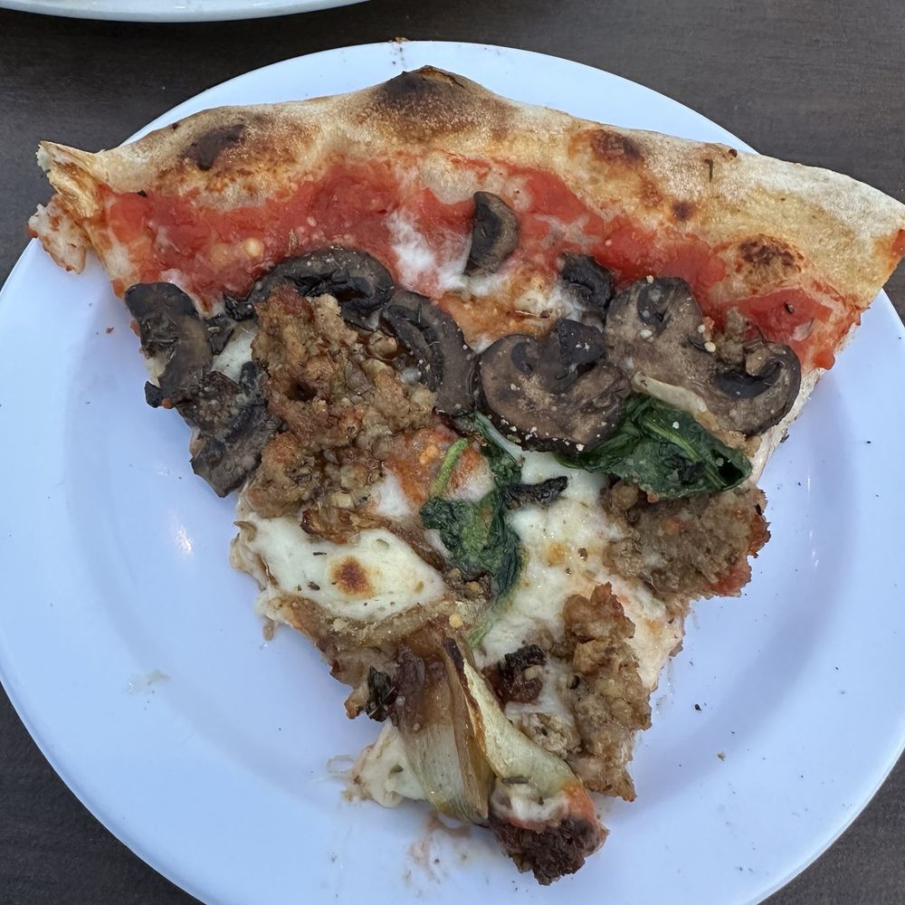 Carmela pizza with mushrooms added. Carmela pizza with mushrooms added.