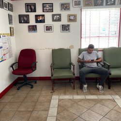 Crown Automotive & Body Shop - Waiting room with boxing photos