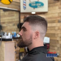Big Chop - After - mid bald fade - scissor cut on top . Beard trim and line up .