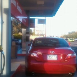 Jiffy Mart - Car parked here to block the lane with non-working pumps but no sign to let customers know.