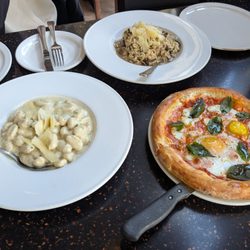 Eden Trattoria - Four-cheese gnocchi, mushroom risotto, and breakfast pizza
