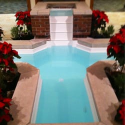 St Andrew's Catholic Church - They do both adult and child baptisms in this.