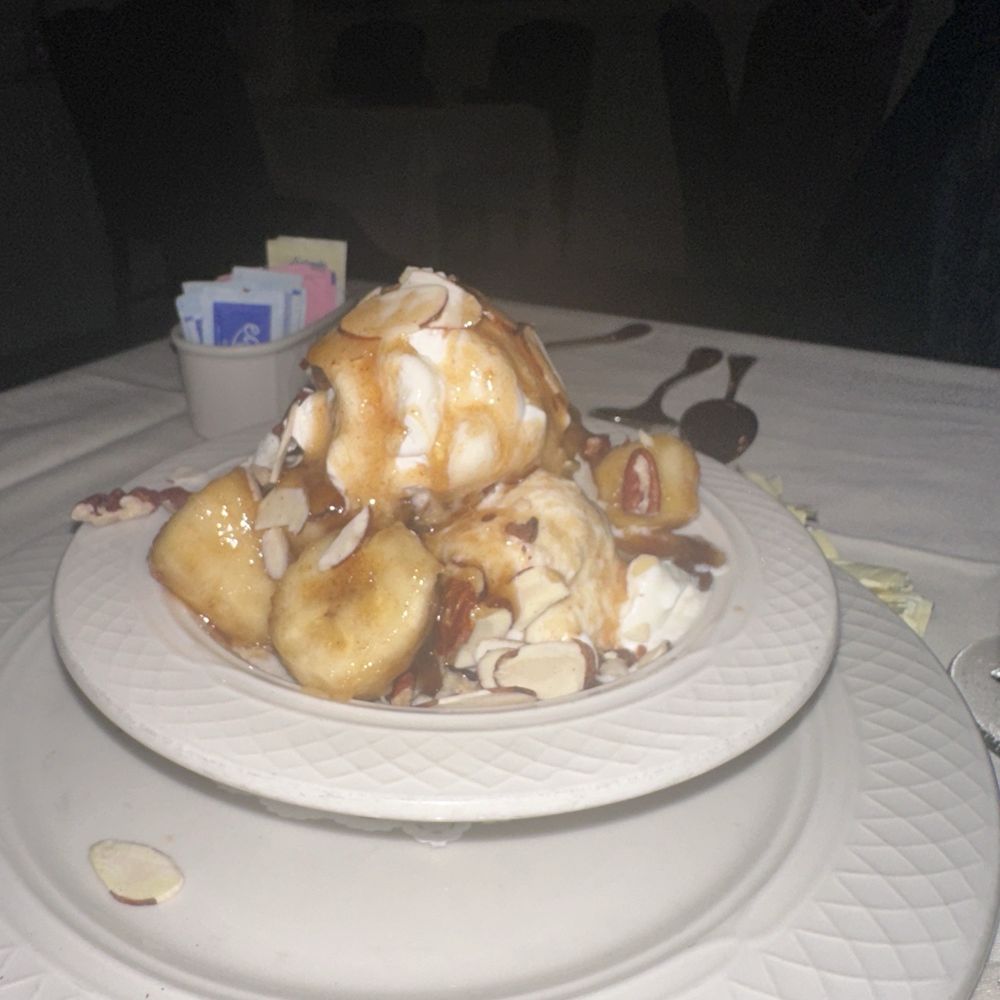 Laury's Restaurant - Bananas Foster pre pop seed table side - Steakhouses Near Me - Charleston, West Virginia Laury's Restaurant - Bananas Foster pre pop seed table side - Steakhouses Near Me - Charleston, West Virginia