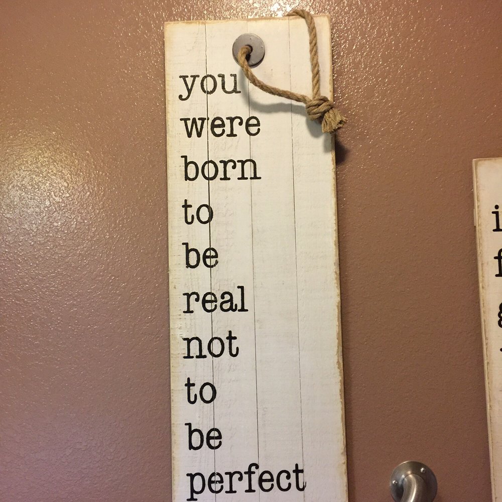 Tangleberries - a picture of a bathroom with a sign that says you were born to be real not to be perfect - Coffee & Tea Near Me - Centerville, Iowa Tangleberries - a picture of a bathroom with a sign that says you were born to be real not to be perfect - Coffee & Tea Near Me - Centerville, Iowa