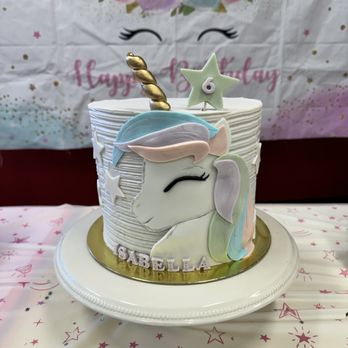 Miss Louise Bakes - a cake with a unicorn on top - Bakeries Near Me Miss Louise Bakes - a cake with a unicorn on top - Bakeries Near Me