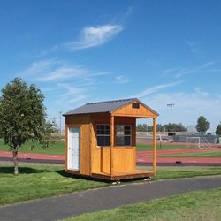 School bus waiting shed. Utility style with playhouse porch