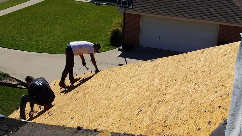 Slide of Cowtown Roofing
