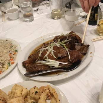 Kam Shing - a plate of food on a table - Chinese Near Me - Montreal, Quebec Kam Shing - a plate of food on a table - Chinese Near Me - Montreal, Quebec