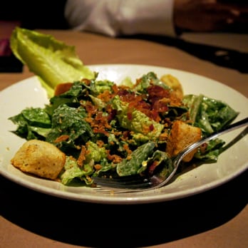 Jack's Astor's - Caesar Salad: crisp romaine lettuce tossed in creamy garlic dressing topped with grated Parmesan Romano cheese - Canadian (New) Near Me - Scarborough, Ontario Jack's Astor's - Caesar Salad: crisp romaine lettuce tossed in creamy garlic dressing topped with grated Parmesan Romano cheese - Canadian (New) Near Me - Scarborough, Ontario