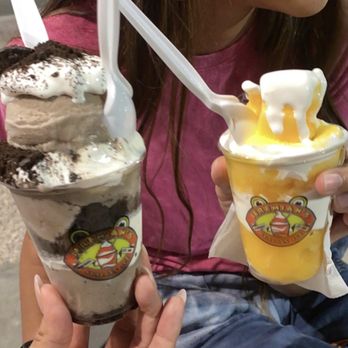 Jeremiah's Italian Ice - Cookie and cream crumble to the left and to the right mango gelato - Desserts Near Me - Gilbert, Arizona Jeremiah's Italian Ice - Cookie and cream crumble to the left and to the right mango gelato - Desserts Near Me - Gilbert, Arizona
