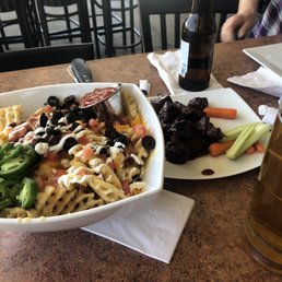 Nachos and burnt ends great atmosphere, staff was pleasant and helpful.