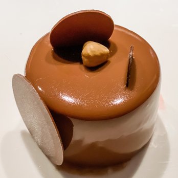 Norman Love Confections - Hazelnut mousse not sure the exact name though - Chocolatiers & Shops Near Me - University Park, Florida Norman Love Confections - Hazelnut mousse not sure the exact name though - Chocolatiers & Shops Near Me - University Park, Florida