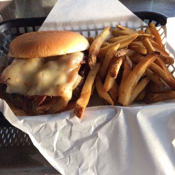 River City Grille - Ghost pepper cheese burger basket (exterior glamour shot) with 1/2 pound angus, ghost pepper cheese, bacon, and sautéed onions - American Near Me - Marble Falls, Texas River City Grille - Ghost pepper cheese burger basket (exterior glamour shot) with 1/2 pound angus, ghost pepper cheese, bacon, and sautéed onions - American Near Me - Marble Falls, Texas