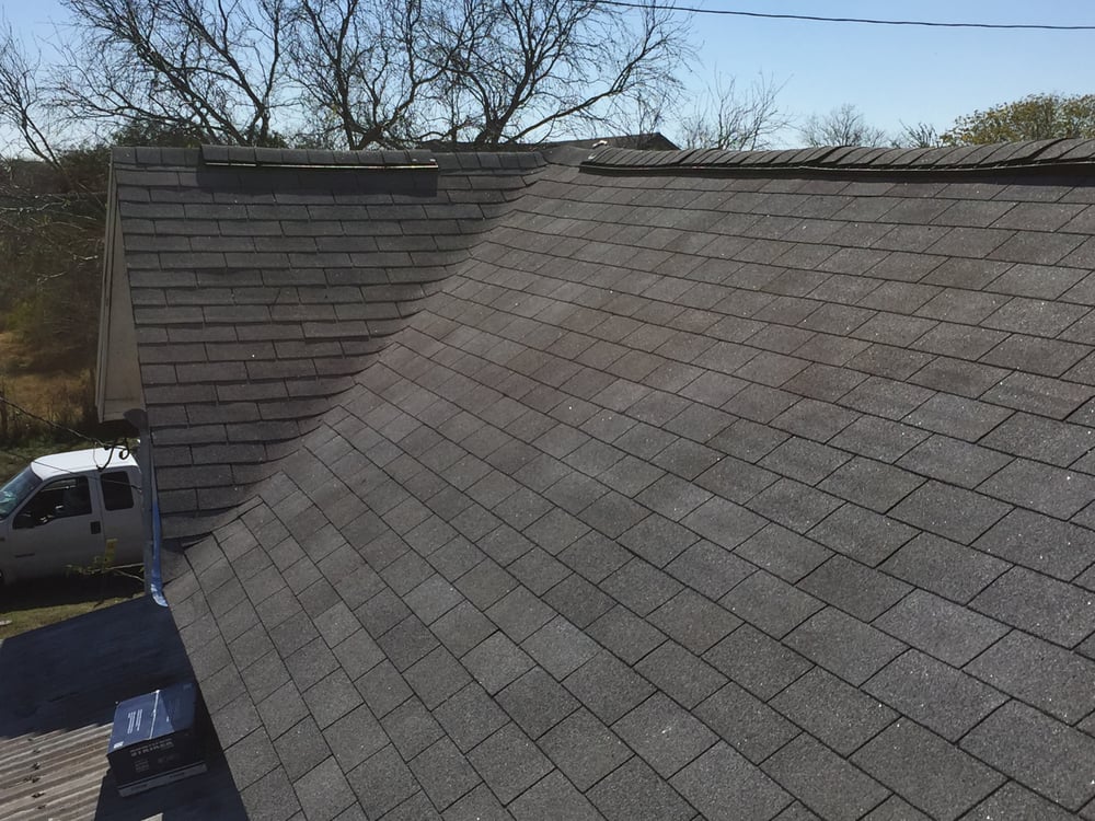 Slide of Tim's Roofing