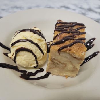 Center Street Grill - Cinnamon Roll Breadpudding - Steakhouses Near Me - Turlock, California Center Street Grill - Cinnamon Roll Breadpudding - Steakhouses Near Me - Turlock, California
