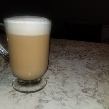 International Cafe - a glass of coffee on a counter - Coffee & Tea Near Me - Fargo, North Dakota International Cafe - a glass of coffee on a counter - Coffee & Tea Near Me - Fargo, North Dakota