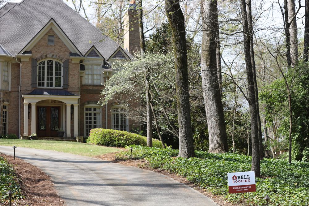Slide of Bell Roofing