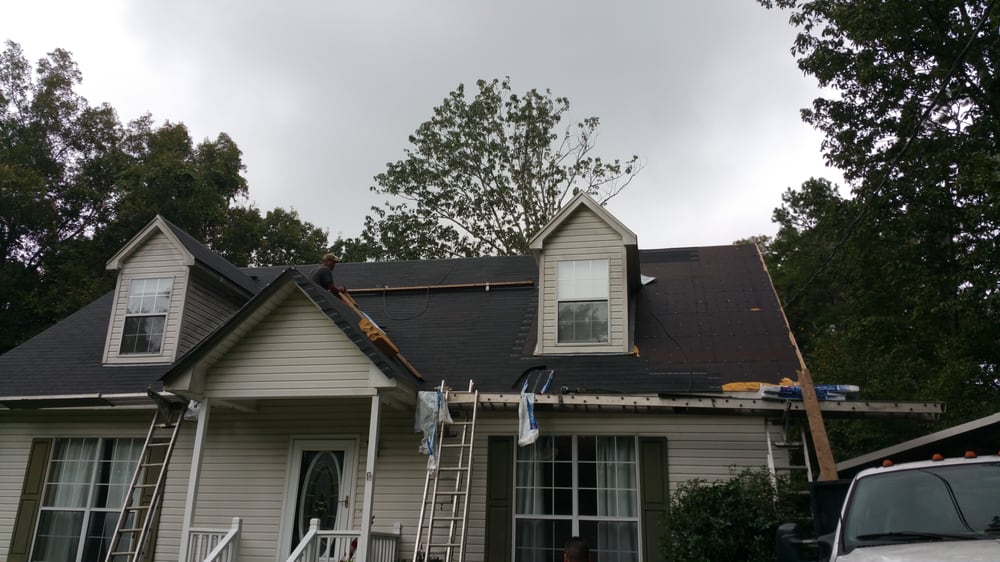 Slide of S and H Roofing