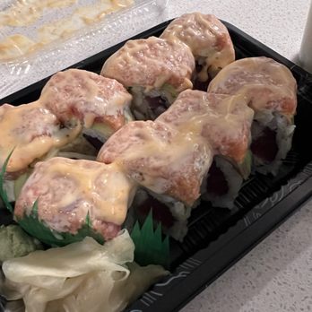 East Sushi - a tray of sushi rolls with sauce - Japanese Near Me - Ewing, New Jersey East Sushi - a tray of sushi rolls with sauce - Japanese Near Me - Ewing, New Jersey