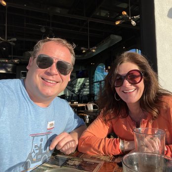 Draft - Two happy customers who just had the spinach salad with salmon! - American Near Me - San Diego, California