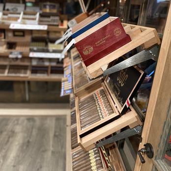 Breakwaters Cigar & Whiskey Lounge - shelves of cigars - Cigar Bars Near Me - Middletown, Rhode Island