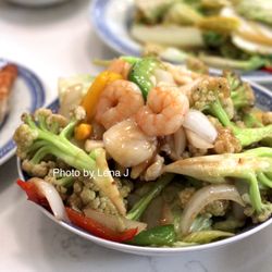 Taishan Cauliflower w/ Seafood ($21.95) - Chinese cauliflower wok-fried & seafood over steamed cabbage w/ sake & white pepper seasoning