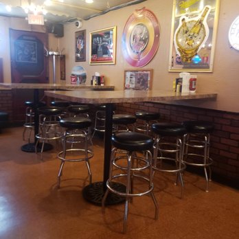 Moran’s Bar and Grill - a couple tables in the intimate space #ReviewsByRL - Pubs Near Me - Anderson, Indiana
