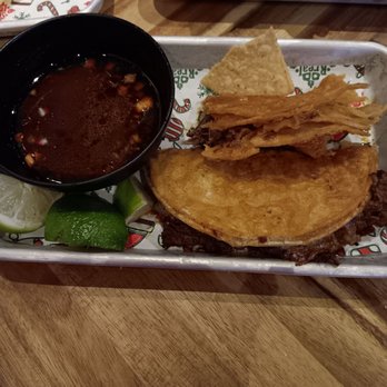 Rreal Tacos - Lawrenceville - Sorry, half eaten birria taco and an untouched one, along with the $3 consomè - Mexican Near Me - Lawrenceville, Georgia Rreal Tacos - Lawrenceville - Sorry, half eaten birria taco and an untouched one, along with the $3 consomè - Mexican Near Me - Lawrenceville, Georgia