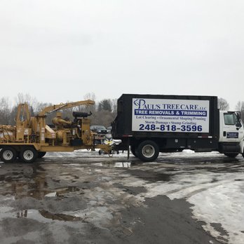 Paul's Tree Care - a truck parked in a parking lot - Tree Services Near Me - Waterford, Michigan Paul's Tree Care - a truck parked in a parking lot - Tree Services Near Me - Waterford, Michigan