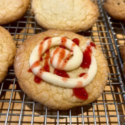 Bee J’s Cookies - Lemonberry Cheesecake. Citrus based sugar cookie w/ cream cheese frosting & strawberry compote.