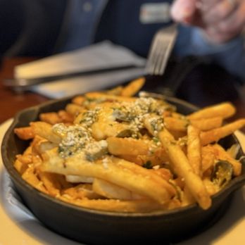 Cornucopia Restaurant - Chimichurri fries. But really cheesy jalapeño fries. - Beer Gardens Near Me - Eugene, Oregon