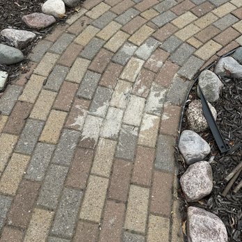 Stern Lawn N' Landscaping - Concrete splatter all over brick walkways, fences - Landscaping Near Me - Wausau, Wisconsin
