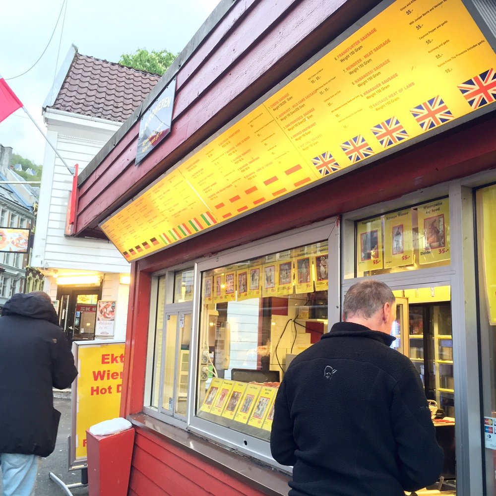 Trekroneren - 1) find your sausage selection on the yellow menu; 2) order said sausage; 3) ask for free lemonade - Hot Dogs Near Me - Bergen, 12 Trekroneren - 1) find your sausage selection on the yellow menu; 2) order said sausage; 3) ask for free lemonade - Hot Dogs Near Me - Bergen, 12