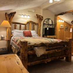 Willow Glen Inn and Event Center - Custom log furniture built by the founding Carter family makes the barn room a favorite among guests.